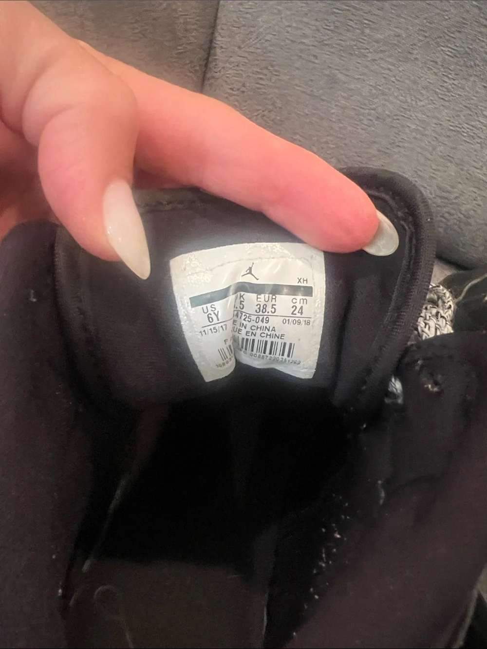 Nike Kids Black High-Top Sneakers with White Swoosh